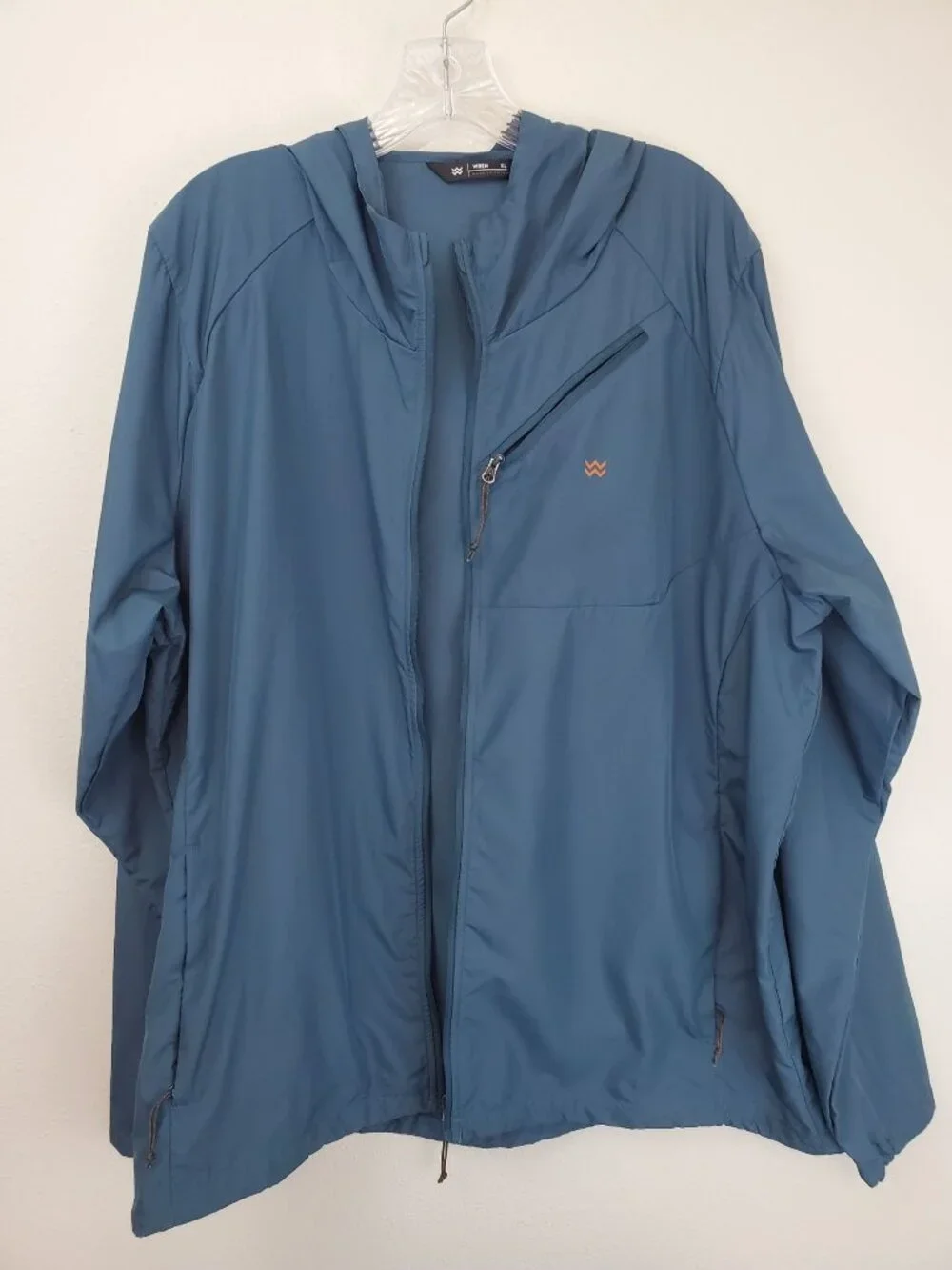 Wren men's 1/2 zip packable pullover windbreaker in Pacific Blue